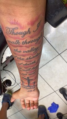 a person with a tattoo on their leg