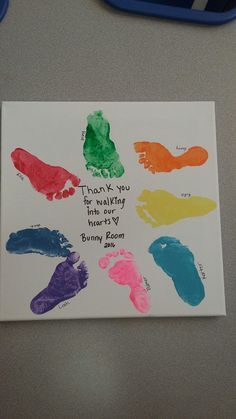 a child's hand and foot prints are displayed on a white paper with the words, thank you for walking