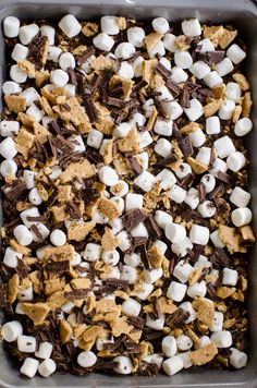 a pan filled with marshmallows and chocolate