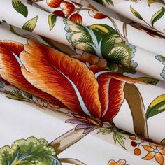 the fabric is colorful and has flowers on it