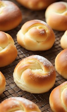 freshly baked rolls on a cooling rack ready to be eaten