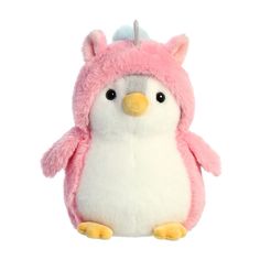 a pink and white penguin stuffed animal wearing a hat with ears on it's head