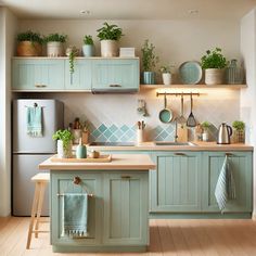 a kitchen filled with lots of green cupboards