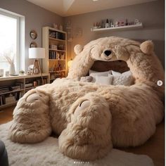 a large teddy bear sitting on top of a bed in the middle of a room