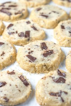 chocolate chip cookies on a baking sheet ready to be baked in the oven for consumption