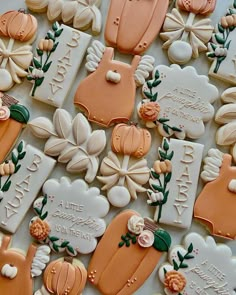 decorated cookies are displayed on a table