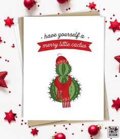 a christmas card with a cactus wearing a santa hat and mittens on it, surrounded by red stars