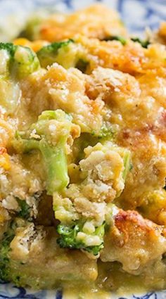 broccoli and chicken casserole on a blue and white plate