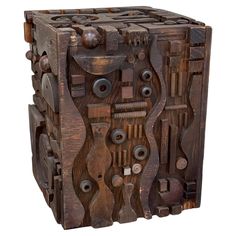 a wooden box with many different tools in it's sides and the top part is made out of wood