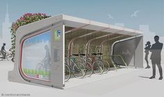 a bus stop with several bicycles parked in it