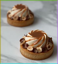 two small desserts are sitting on a table