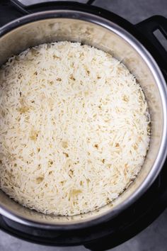 rice is cooked in an instant pot on the stove top, ready to be cooked