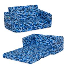 the blue camouflage couch is set up to be used as a child's bed