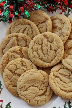 a white plate topped with cookies on top of a table