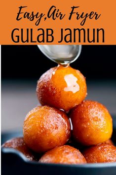 oranges stacked on top of each other with the words easy air fryer gulab jamun