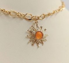 Sun Pendant Aesthetic, Sun Crystal Necklace, Fire Themed Jewelry, Sun Aesthetic Jewelry, Sun Inspired Jewelry, Orange Necklace Jewelry, Yellow Necklace Aesthetic, Gold Sun Jewelry, Sun Themed Clothes