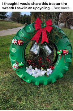 a christmas wreath with two bells hanging from it's side and the words i thought i would share this tractor tire wreath with saw in an upcycling - see more