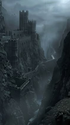 a castle on a cliff in the middle of a mountain with fog and water surrounding it