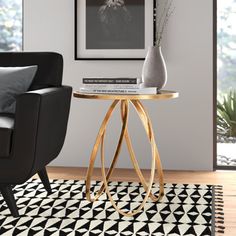 a living room with a black chair and white rug