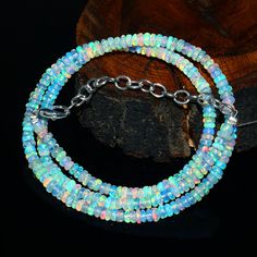 Extremely Beautiful Necklace- Natural Ethiopian Welo Fire Opal Rondelle Beads Necklace| Welo Opal Beads Beaded Necklace|3-4.5 MM Opal Rondelle Beads Gemstone Type                 :Opal Gemstone Item Code                           :   A-0335 Origin                                 -:100% Natural Ethiopian Opal Necklace Grade                                  -:  AAA++ Stone shape                       -: Smooth Rondelle Beads Stone color                         -: Same As Picture Metal-: Length- Ethiopian Opal Necklace, Necklace Opal, Opal Beads, Welo Opal, Beautiful Necklace, Opal Necklace, Beads Necklace, Opal Gemstone, Ethiopian Opal