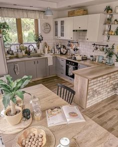 a kitchen filled with lots of furniture and decor