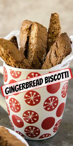 gingerbread biscotti in a cup on a table