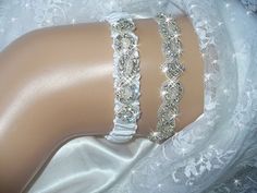 Wedding Garter, Bridal Garter, Crystal Rhinestone Garter, Diamond Garter, Handmade Silver Garter, Rhinestone Garter with Toss, Weddings *PLEASE VISIT MY ETSY SHOP, BRIDAL AMBROSIA, to see more of my beautiful wedding garters, wedding tiaras, headbands, headpieces, flower girl baskets and ring bearer pillows! Lots of satins, laces, flowers, feathers and BLING!! www.etsy.com/shop/bridalambrosia ORIGINAL DESIGN WEDDING GARTER SET! *I also have a "SOMETHING BLUE VERSION" available with sapphires (picture 2) or any other birthstones by request at this link; https://www.etsy.com/listing/260613074/wedding-garter-the-original-design?ref=shop_home_feat_2 *This is also available as a SINGLE KEEPSAKE GARTER at this link; This is available as just a single Keepsake Garter (picture 5) at this link,http Diamond Garter, Wedding Garder, Bridal Accessories Belt, Crystal Garter, Rhinestone Garter, Garter Wedding, Blue Garter, Bridal Garters Set, Long Train Wedding Dress