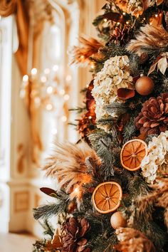 25+ Christmas Tree Ideas Orange Slices Yellow House Christmas Decor, Dried Orange Pumpkin, Dried Fruit Garland Christmas Tree, Christmas Tree With Fruit Decorations, Dried Orange Christmas Wrapping, Copper Orange Christmas Tree, Xmas Natural Decorations, Green And Burnt Orange Christmas Tree, Winter Aesthetic Christmas Tree