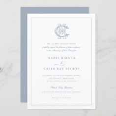 the front and back of a wedding card with an ornate monogrammed crest on it