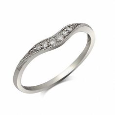 a white gold wedding ring with diamonds