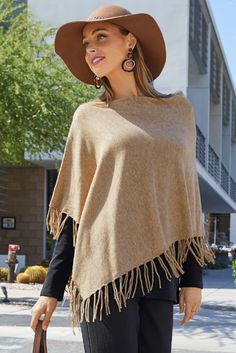 Fringe Sweater Poncho | Boston Proper | Destined to be your go-to for travel and everyday wear, this oh-so-soft-and-cozy sweater poncho is lightweight, versatile and trimmed with flowy fringe. Merry Birthday, Comfortable Skirts, Sweater Poncho, Boyfriend Blazer, Fall Clothing, Fringe Sweater, Casual Work Outfit