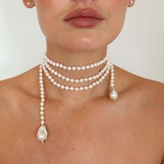 White fresh water pearls sit on a 170cm cotton thread piece, finished with a baroque pearl at each end. This pearl necklace is fabulously unique and versatile. See the images for the many ways to wear this necklace. Wrap it, tie it, loop it, wear it! A timeless and fabulous pearl necklace. Avoid perfume and hairspray. Store in a safe place to avoid scratching. Braided Pearl Necklace, Wedding Statement Necklace, Pearl And Aquamarine Necklace, Tie Necklace Diy, European Jewelry Trends, Cool Pearl Necklace, Pearl And Stone Necklace, Stacked Pearl Necklace, Funky Necklaces Jewelry