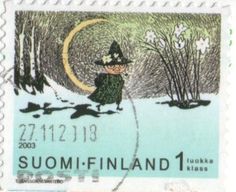 a stamp with an image of a witch on the moon and trees in the background