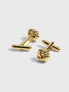 Go for gold. If you're looking for a subtle way to add a little flash to your look, these cufflinks with a refined knot design are a clear winner. Polished brass Bullet back closure Knot Cufflinks, Tuxedo Styles, Suit Prom, Men's Brooch, Black Tux, Going For Gold, Wedding Plan, Gold Cufflinks, Knot Design