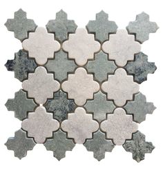 a white and grey mosaic tile pattern on a white background, with an irregular design in the middle