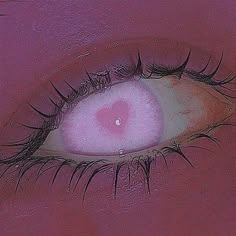 an eye with long lashes and pink eyeshade