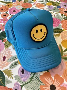 Our Smiley Face Trucker Hat is sure to bring a smile to everyone you pass by! Comfortable, breathable, and adjustable--one size fits most. Colors being restocked as quickly as possible. Keep smiling! Adjustable Novelty Sports Hats, Blue Fun Style Snapback Hat, Fun Sports Visor Hat, Fun Blue Adjustable Trucker Hat, Adjustable Smiley Face Cap, Fun Blue Snapback Hat With Flat Brim, Fun Blue Snapback Hat, Blue Fun Baseball Cap One Size, Fun Blue Baseball Cap One Size Fits Most