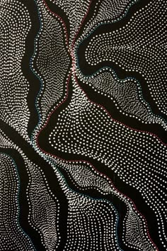 an abstract painting with white dots on black