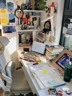 a desk with many books on it and a chair in front of the desk is full of papers