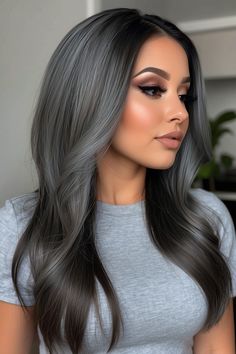 Elevate your style with our ultimate guide to perfecting the grey blending dark hair trend. From techniques to product recommendations, we've got you covered for a flawless transformation. Dark Hair With Grey, Dark Gray Hair Color, Trendy Grey Hair, Black Hair With Ash Highlights, Smokey Ash Brown Balayage Dark, Black And Gray Hair, Dark Grey Hair Color, Ash Grey Hair, Charcoal Hair