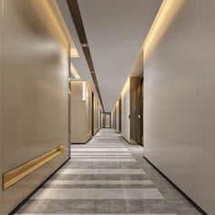 an empty hallway with beige walls and flooring is pictured in this image, there are no doors on either side of the corridor