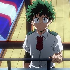 an anime character with green hair wearing a tie and looking over a rail at the camera