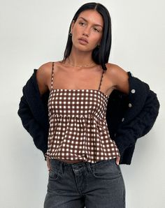 Back to school in our new gingham. The Charlita top in tonal gingham brown features thin cami straps, a square neckline with a band over the bust, an under-bust seam and puffball hem. Complete the look with our classic Parallel jeans in washed black grey. MODEL WEARS SIZE: EXTRA SMALL - MODEL HEIGHT:5'7 Parallel Jeans, Upcycling Clothes, Party Dress Long Sleeve, Bandeau Dress, Clothes To Make, Party Dress Long, Basic Tops, Summer Maxi Dress