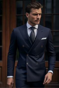 Step into timeless sophistication with our Men's Classic Dark Blue Double Breasted Suit. Pair it with a crisp white dress shirt and a silk navy tie for a classic and polished ensemble. #2023Fashion #StyleTrends #FashionInspo #OOTD2023 #StreetStyle #RunwayLooks #Fashionista #SustainableFashion #CapsuleWardrobe #VintageFashion #EcoFriendlyFashion #FashionGoals #FashionForward #InstaStyle #TrendyOutfits #DesignerFashion #FashionBlogger #ChicStyle #WardrobeEssentials #SeasonalFashion Blue Double Breasted Suit, Navy Blue Suit Men, Mens Wedding Suit, Classic Blue Suit, Suit For Men Wedding, Dark Blue Suit, Mens Dress Outfits, Man Suits