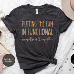 "This cute, vintage \"Putting the Fun in Functional\" occupational therapy shirt is the perfect tee for occupational therapists, OT assistances, OT students, or pediatric occupational therapists! PRODUCTION & SHIPPING   All of our shirts are made to order, which means they are specially made just for you! Production time is typically 1 to 3 business days (2 business days on average), and shipping time is typically 2 to 5 business days (3 business days on average).   SIZE & FIT   Our relaxed-fit Occupational Therapy Assistant Shirts, Gift For Occupational Therapist, Occupational Therapist Outfits Women, Behavioral Therapist, Occupational Therapy Gifts, Occupational Therapy Shirts, Punching People, Therapy Shirt, What Makes You Beautiful