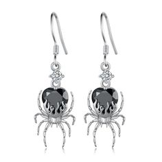 PRICES MAY VARY. Design Inspiration: Landmarks associated with Halloween, such as haunted houses, cemeteries, and creepy caves, are full of spiders and cobwebs. So spiders have become an important symbol of Halloween. This spider earring can be used as an accessory for the upcoming Halloween, but the style can also be worn as an everyday accessory. Qualitative Materials: The spider goth earrings for women are made of 925 sterling silver. Nickel-free, lead-free, cadmium-free and does not contain Sterling Silver Jewelry For Halloween Party, Gothic Dangle Halloween Jewelry, Gothic Dangle Jewelry For Halloween, Halloween Vampire Metal Earrings, Spooky Silver Dangle Earrings, Vampire Style Metal Earrings For Halloween, Gothic Sterling Silver Earrings For Parties, Silver Metal Earrings For Halloween, Nickel-free Silver Earrings For Halloween