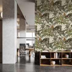 an office with a large wall paper and wooden shelves