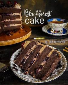 a slice of chocolate cake sitting on top of a white plate