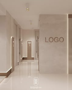 an empty hallway with the logo on the wall