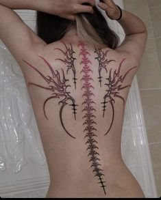 Aesthetic Tattoos Women Back, Wings Tattoo Women Back, Back Tattoos Down The Spine, Tattoo Ideas Wings Back, Grunge Back Tattoo Women, Tattoos For Women Back Spine, Back Grunge Tattoo, Spine Tattoos Of Spine, Tattoo Ideas Tribals